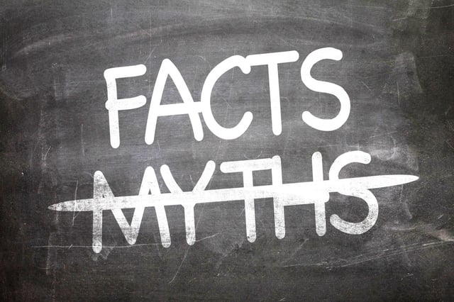 Facts Myths written on a chalkboard 
